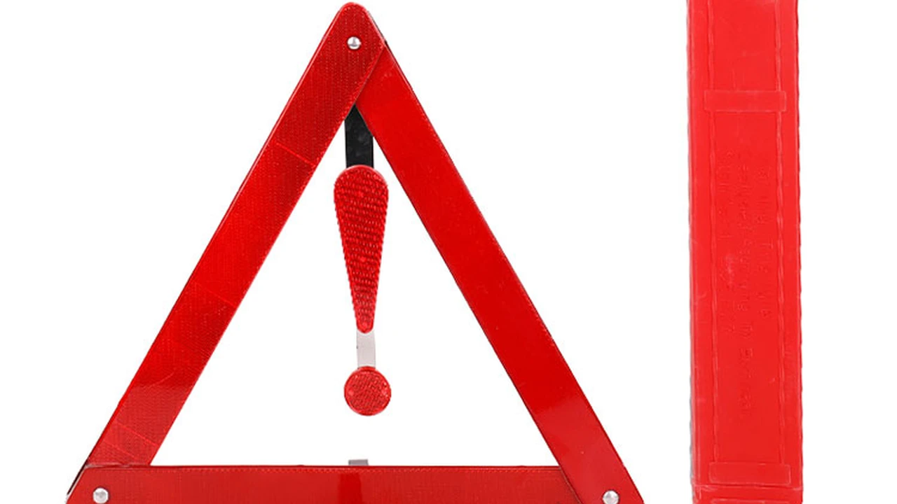 overhead view of corned beef sliced and on a platter with cabbage, potatoes, and carrots